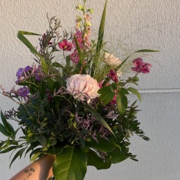 a person holding flowers