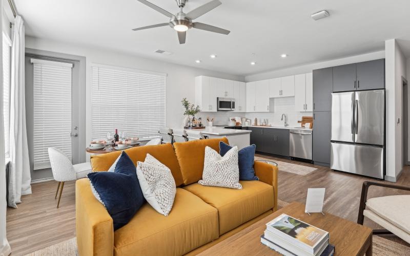 a living room with a couch and a table