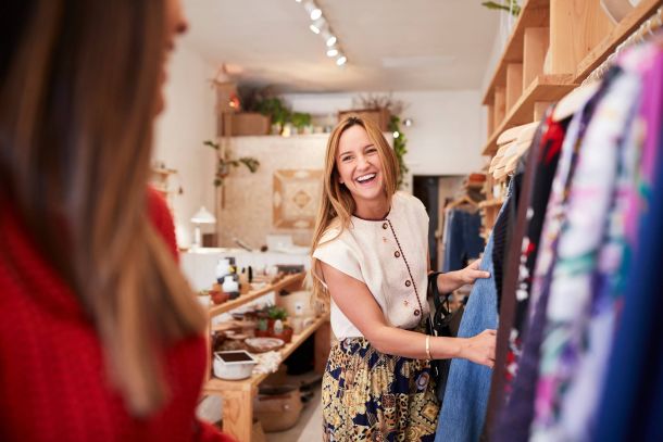 Alta Cosner Luxury Apartments with two female friends shopping at a convenient retail clothing store